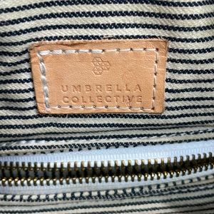 Umbrella collective backpack tote in Merlot leather